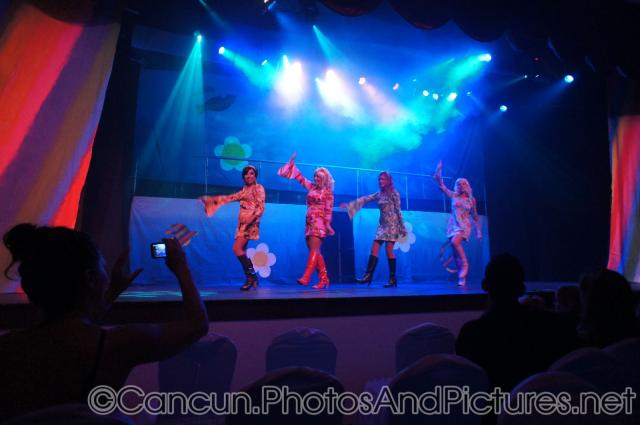 Women in 70s costumes dance at GR Solaris.jpg