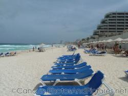 Looking down a row of beach chairs at Crown Paradise resort next to GR Solaris.jpg