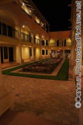 A courtyard in the middle of a guest complex at Ocean Coral & Turquesa.jpg