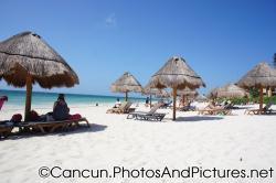 Beach chairs and umbrellas at Ocean Coral & Turquesa beach.jpg