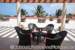 Chairs and tables at patio right outside Ocean Coral & Turquesa lobby.jpg