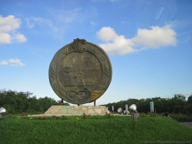 Large plate sculpture depicting Mayan culture in Playa del Carmen.jpg
