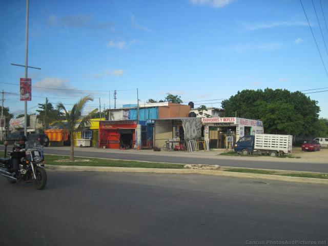 Collection of shops along a Playa del Carmen street.jpg