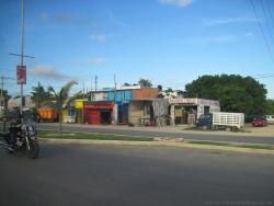 Collection of shops along a Playa del Carmen street.jpg