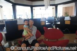 Darwin and daddy at the lobby of Ocean Coral & Turquesa.jpg