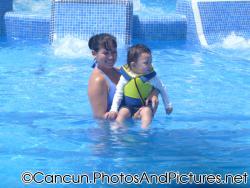 Darwin being held by mommy at Ocean Coral & Turquesa pool.jpg