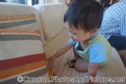 Darwin plays with toy car at Ocean Coral & Turquesa lobby.jpg
