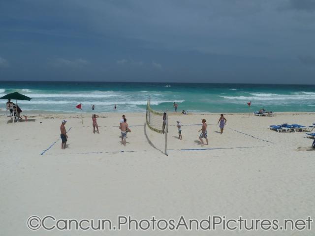 People playing beach volleyball at GR Solaris.jpg